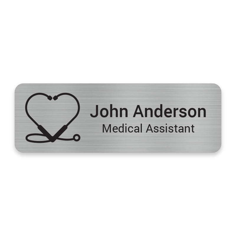 Caring Heart engraved healthcare name badge featuring a heart-shaped stethoscope design for nurses and healthcare staff.
